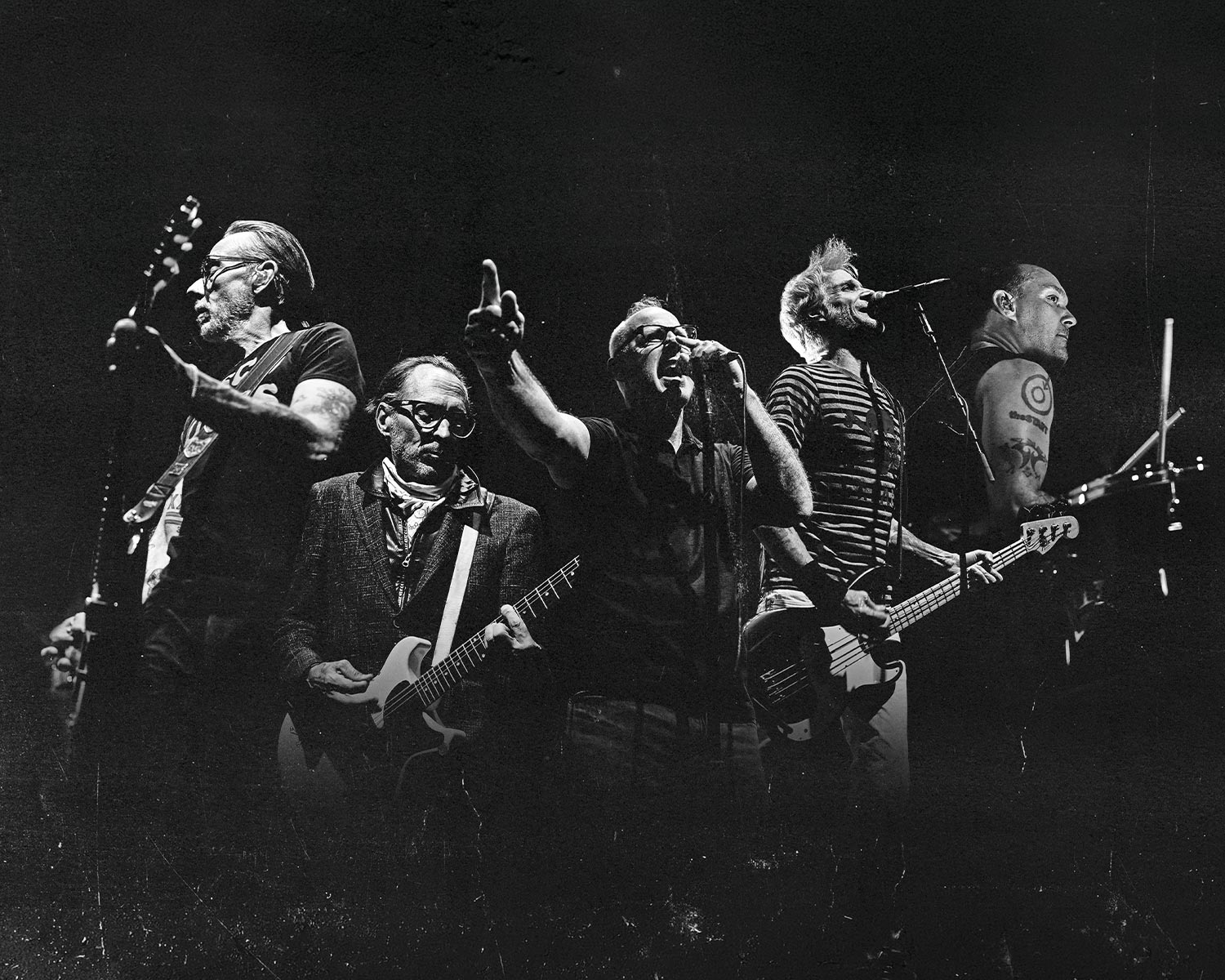 The members of Bad Religion pose together in black and white